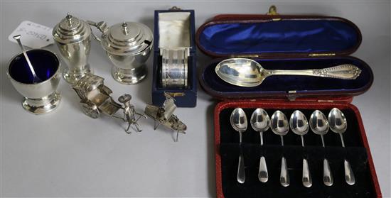 A George VI three piece silver condiment set, a cased set of six coffee spoons, a cased christening spoon,